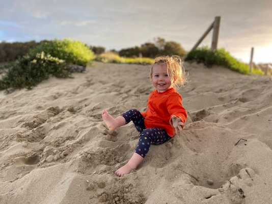 Avery enjoying the sand at Shoalhaven Heads