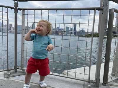 Avery posing on the Brooklyn waterfront